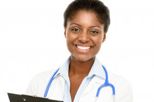 A physician smiling at the camera