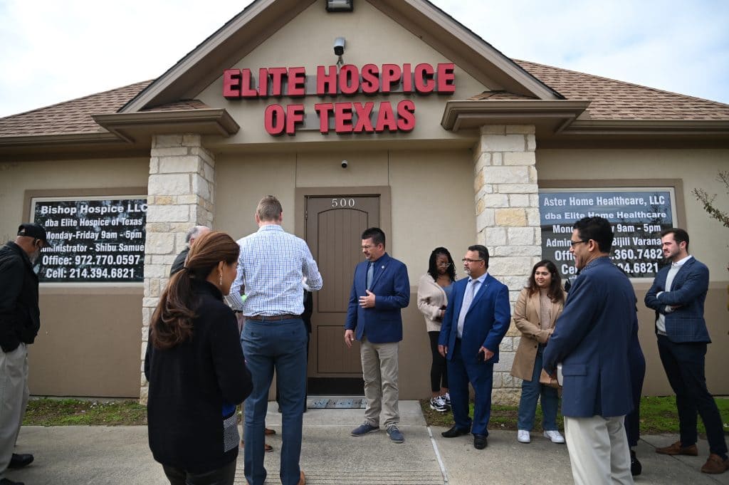 ribbon cutting outside the office