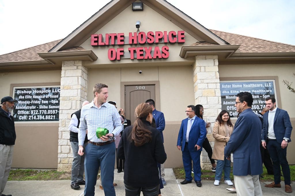 ribbon cutting outside the office