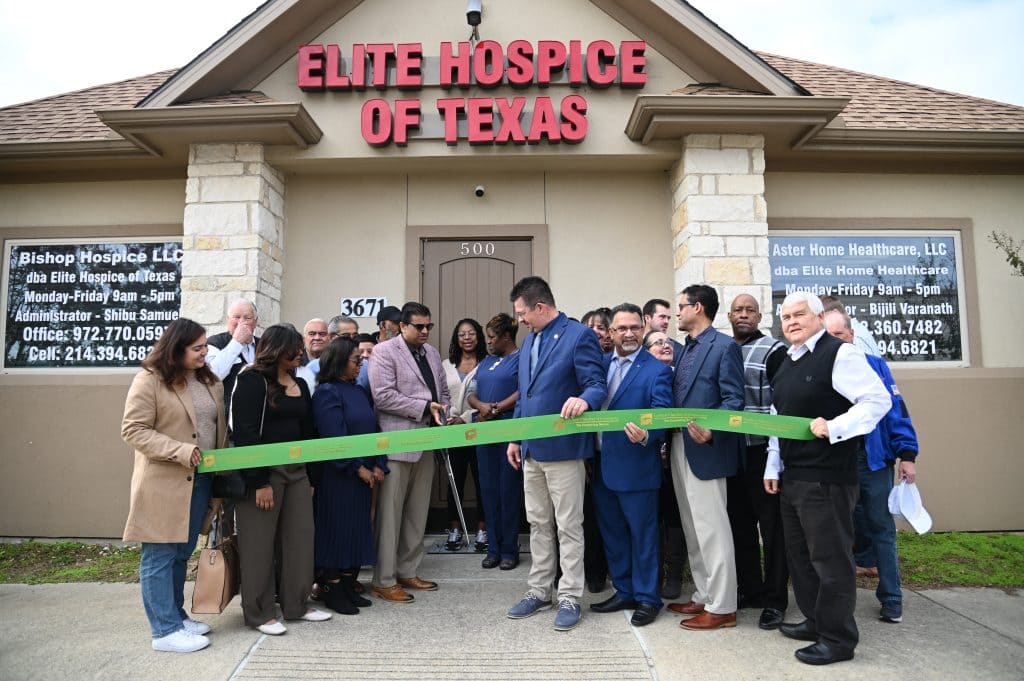 ribbon cutting outside the office