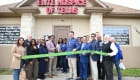 ribbon cutting outside the office