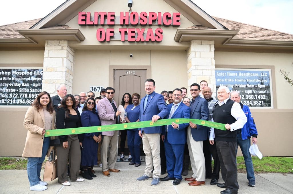ribbon cutting outside the office