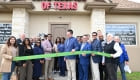 ribbon cutting outside the office