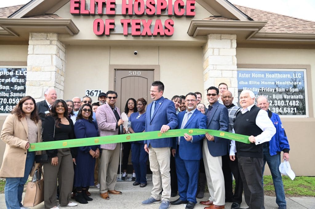 ribbon cutting outside the office