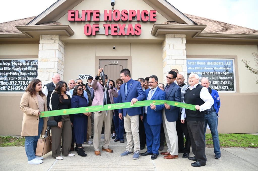 ribbon cutting outside the office