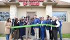 ribbon cutting outside the office