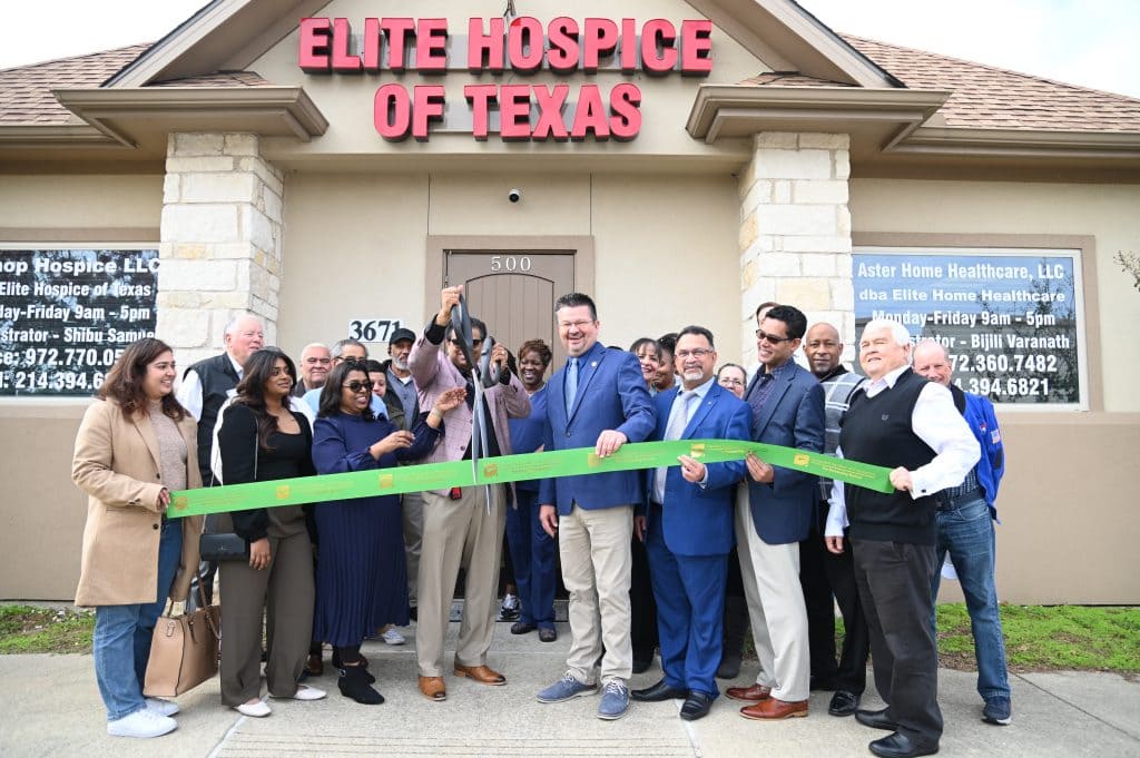ribbon cutting outside the office