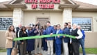 ribbon cutting outside the office