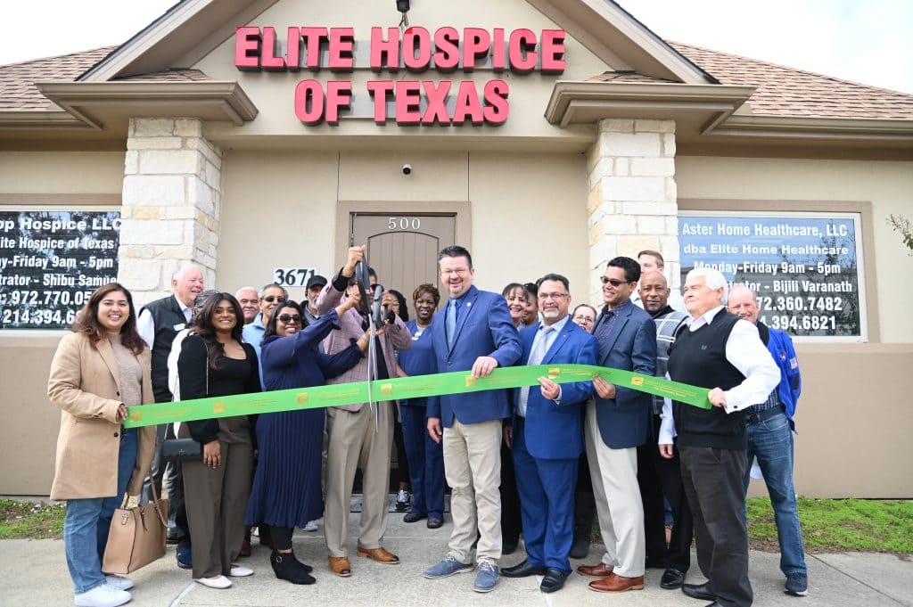 ribbon cutting outside the office