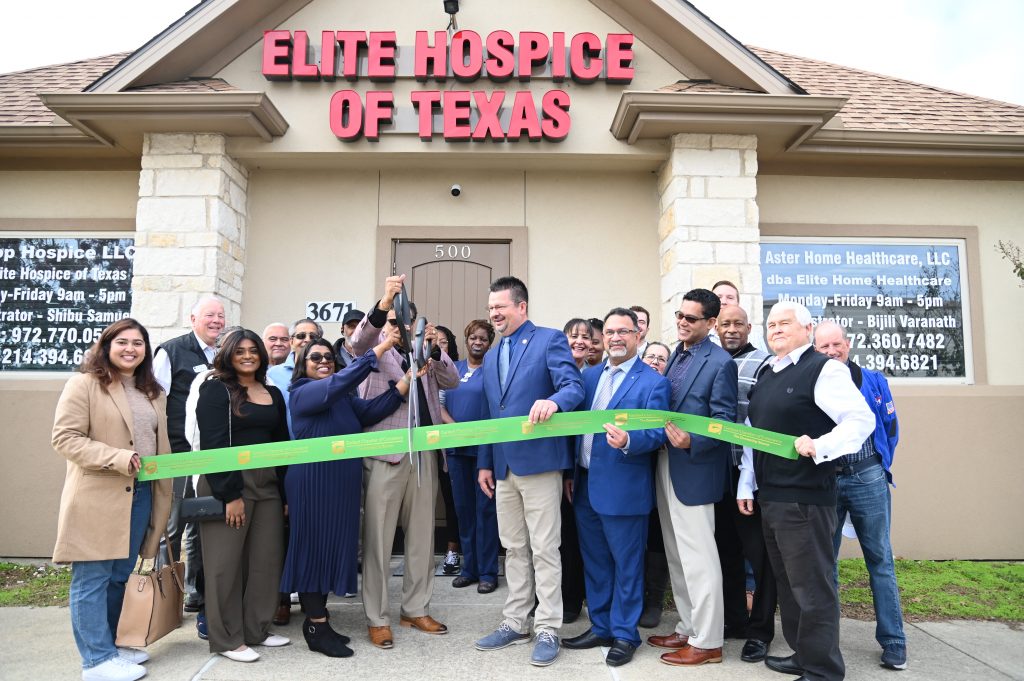 ribbon cutting outside the office