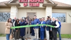 ribbon cutting outside the office