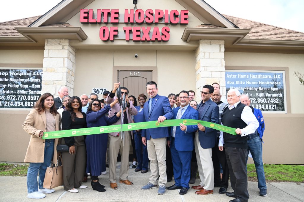 ribbon cutting outside the office