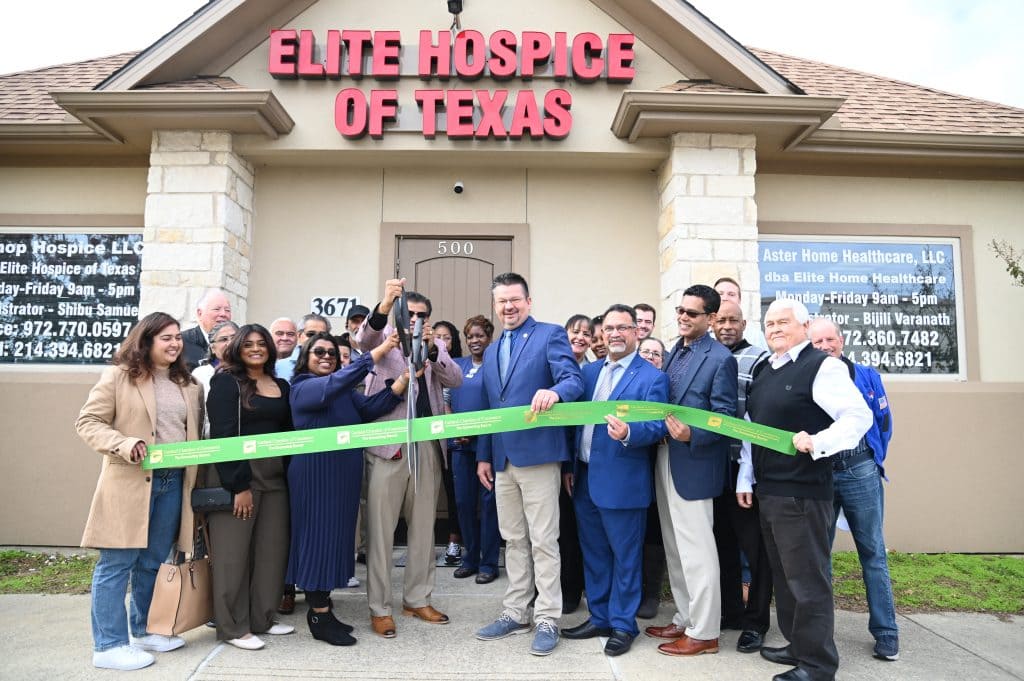 ribbon cutting outside the office
