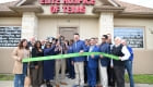 ribbon cutting outside the office