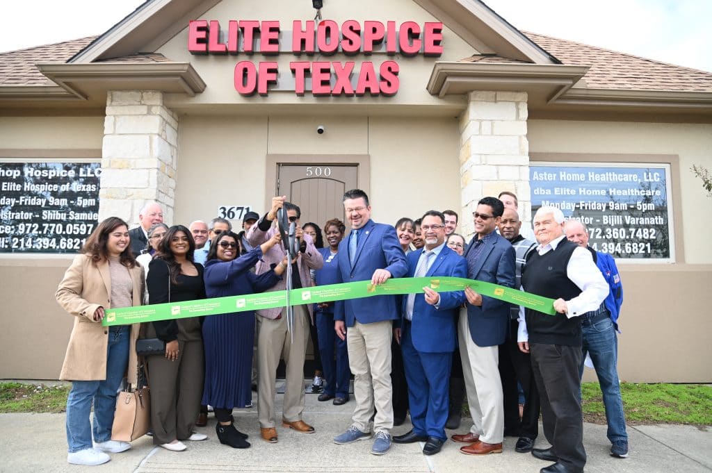 ribbon cutting outside the office