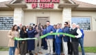 ribbon cutting outside the office