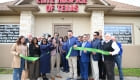 ribbon cutting outside the office