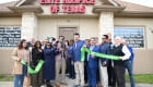 ribbon cutting outside the office