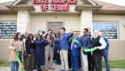 ribbon cutting outside the office