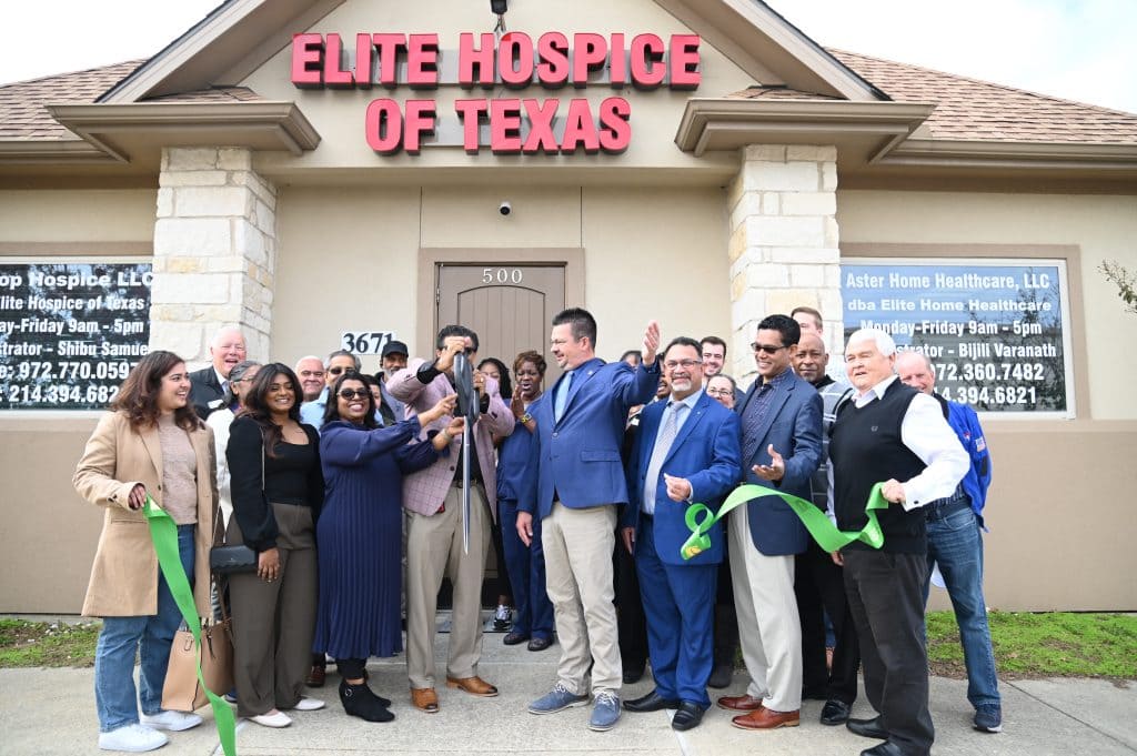 ribbon cutting outside the office