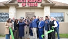 ribbon cutting outside the office