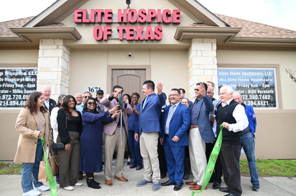 ribbon cutting outside the office