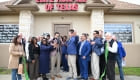 ribbon cutting outside the office