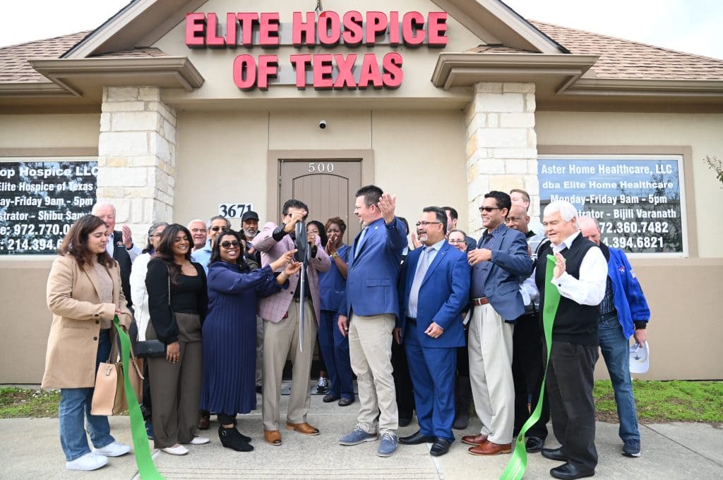 ribbon cutting outside the office