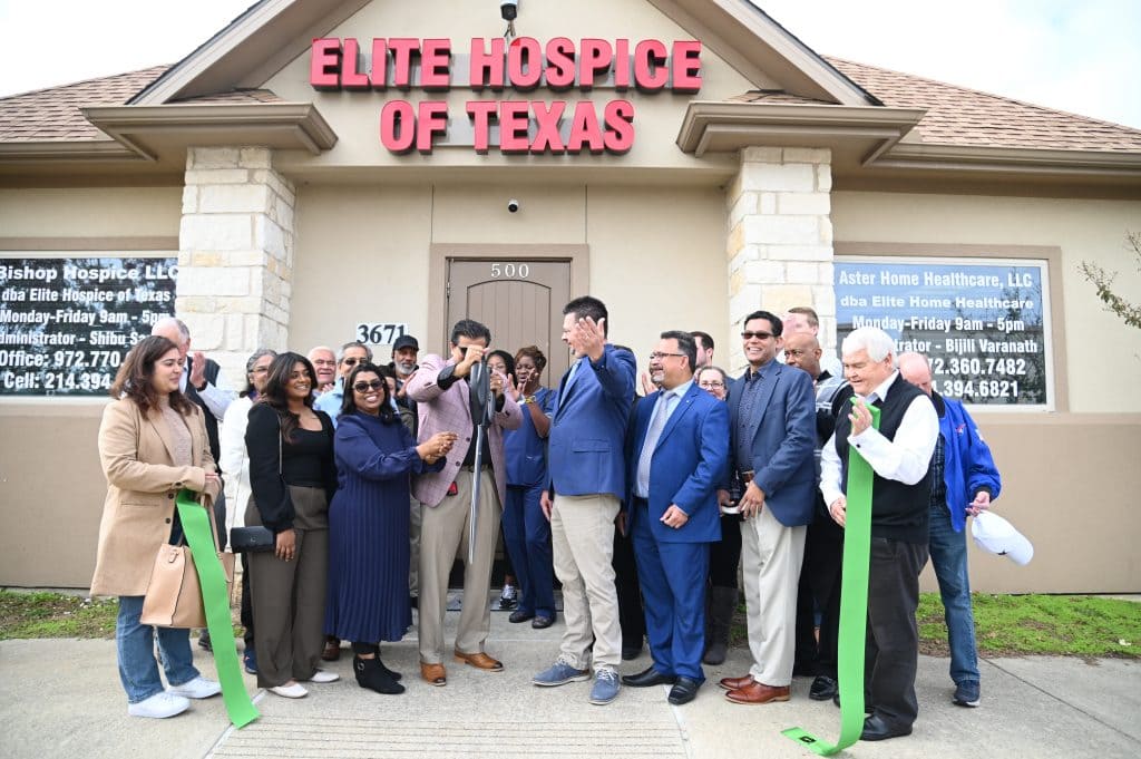ribbon cutting outside the office