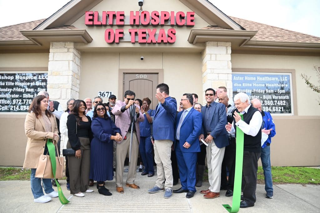 ribbon cutting outside the office