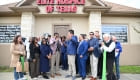 ribbon cutting outside the office