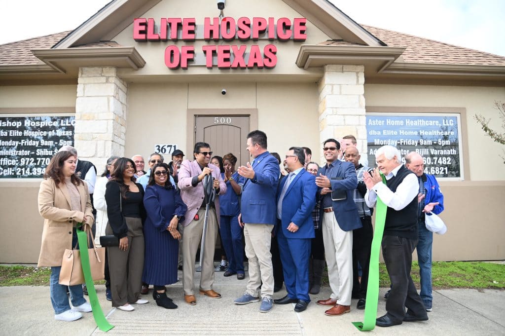 ribbon cutting outside the office