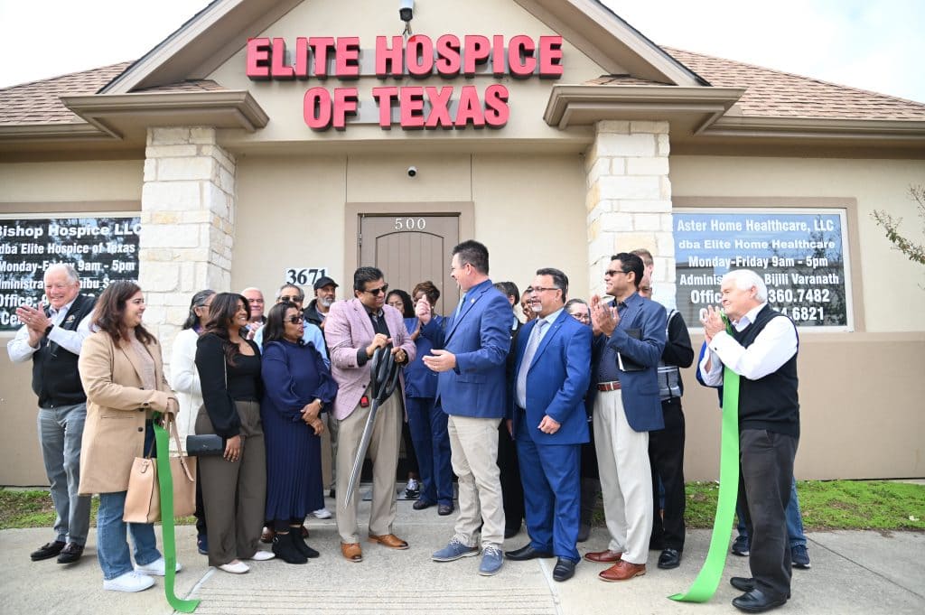 ribbon cutting outside the office